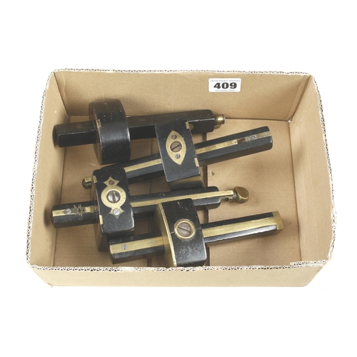 409 - Four ebony and brass mortice gauges G+