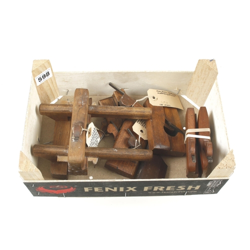 598 - A small fenced centre bead plane and 6 other miniature beech planes G+