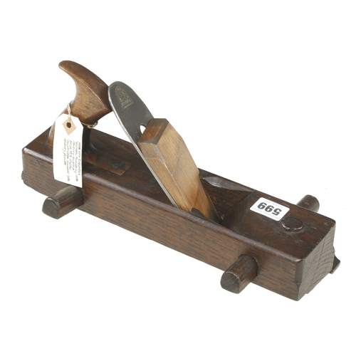 599 - An unusual craftsman made oak panel fielding plane with fence, ex Richard Knight collection G+