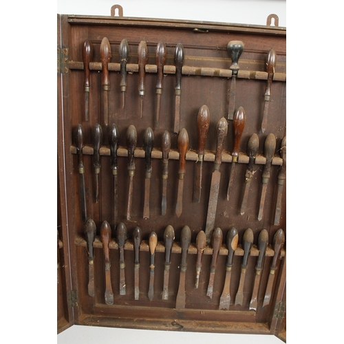 613 - 36 ornamental turning tools, many by HOLTZAPFFEL with lignum or rosewood handles in mahogany triptyc... 