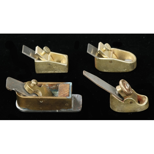 666 - Four small brass planes G