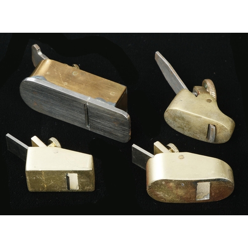 666 - Four small brass planes G