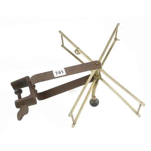 741 - An iron and brass wool winder G