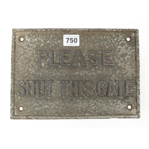 750 - A cast iron sign 