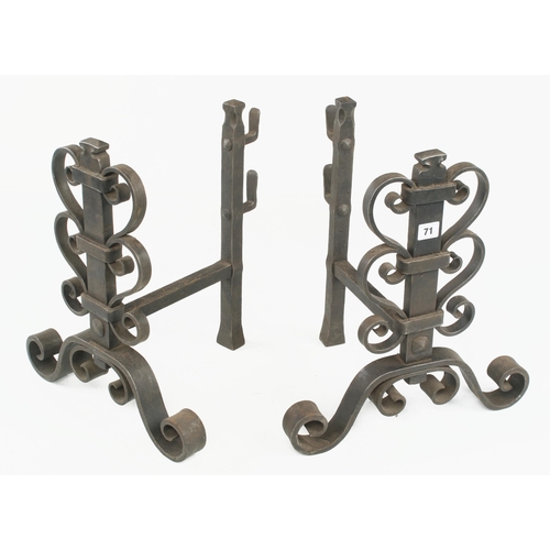 71 - A pair of wrought iron fire dogs 17