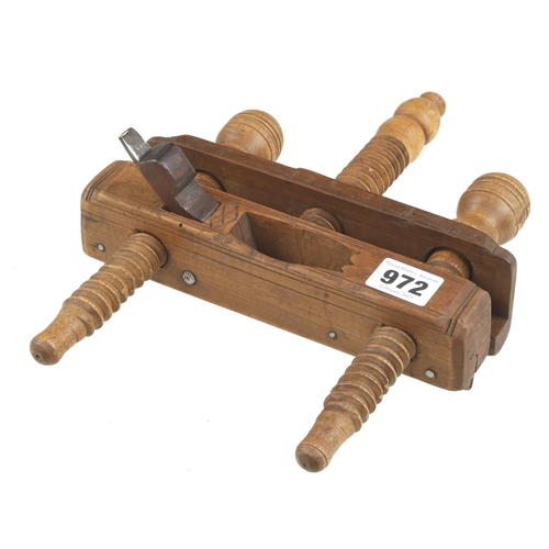 972 - A small European fruitwood plough plane with triple screwstems and cupids bow decoration at mouth G