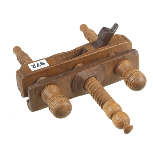 972 - A small European fruitwood plough plane with triple screwstems and cupids bow decoration at mouth G