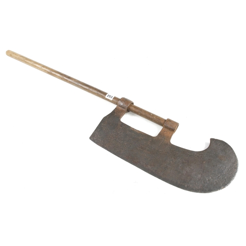 253 - A large French vine axe with 18