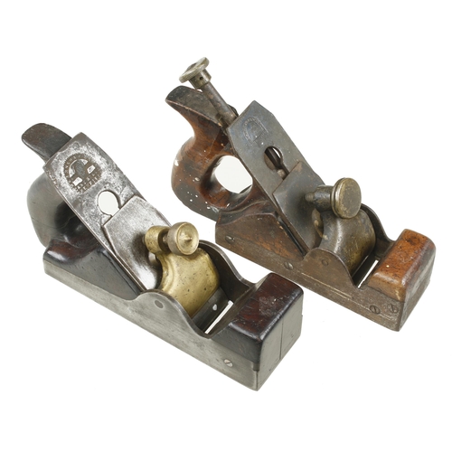 262 - Two parallel iron smoothers with cracked handles G