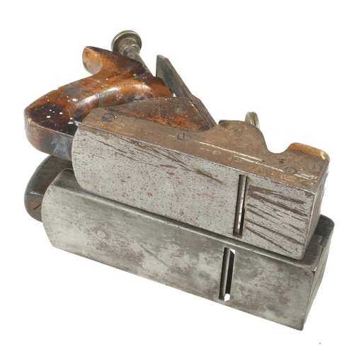 262 - Two parallel iron smoothers with cracked handles G