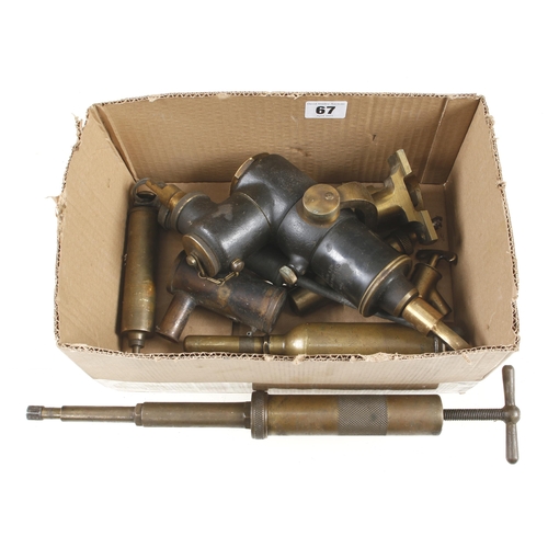 67 - Eight brass items G