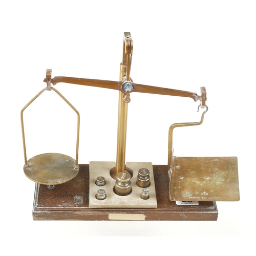 29 - A set of brass postage scales by DEGRAVE c/w 5 weights G