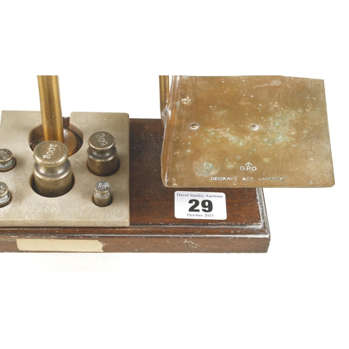 29 - A set of brass postage scales by DEGRAVE c/w 5 weights G