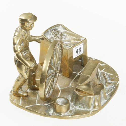 48 - A brass model of a wheelwright at work G+