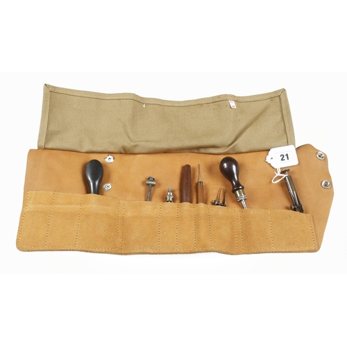 21 - Eight small watchmaker's tools in suede roll G+