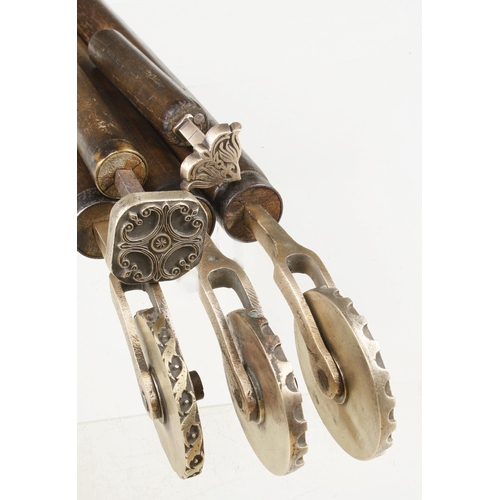 57 - Three bookbinder's brass border rolls and two embossing stamps G+