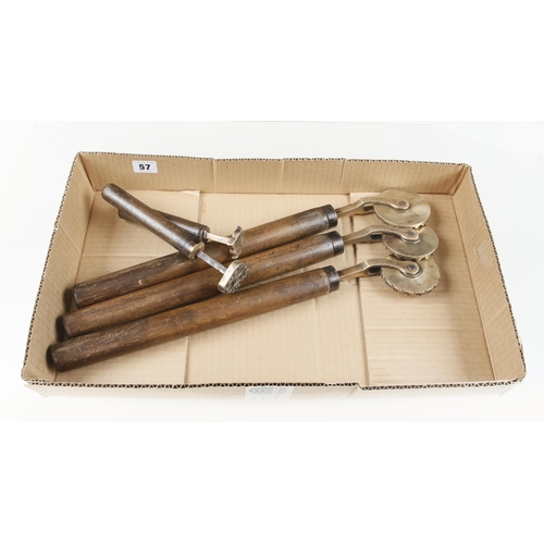 57 - Three bookbinder's brass border rolls and two embossing stamps G+