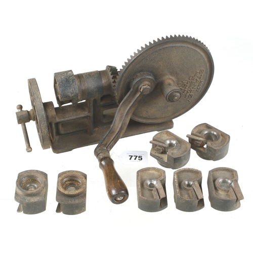 A STANLEY No 77 dowel & rod turning machine c/w 8 cutter heads, lacks ...