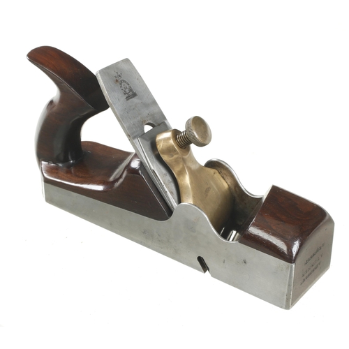 A probably unique special order d/t steel skew mouth rebate plane by SPIERS Ayr 10" x 2 1/2" with rosewood infill and open handle and orig W & P iron (previously sold in our Int. Cat. No 59) F
