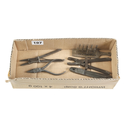 107 - Three watchmaker's sliding tongs etc G+