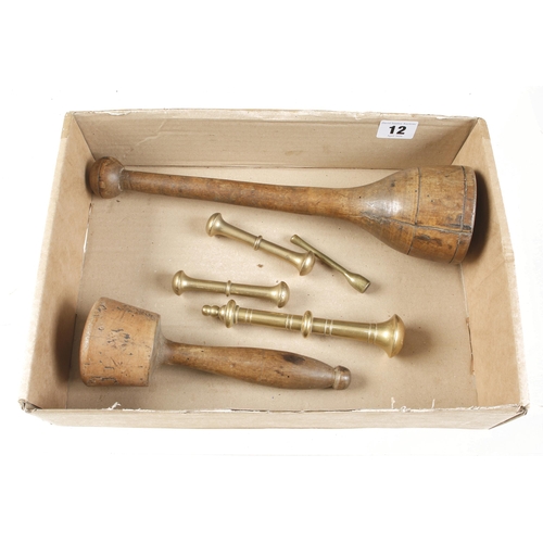 12 - Four brass and two wood pestles G