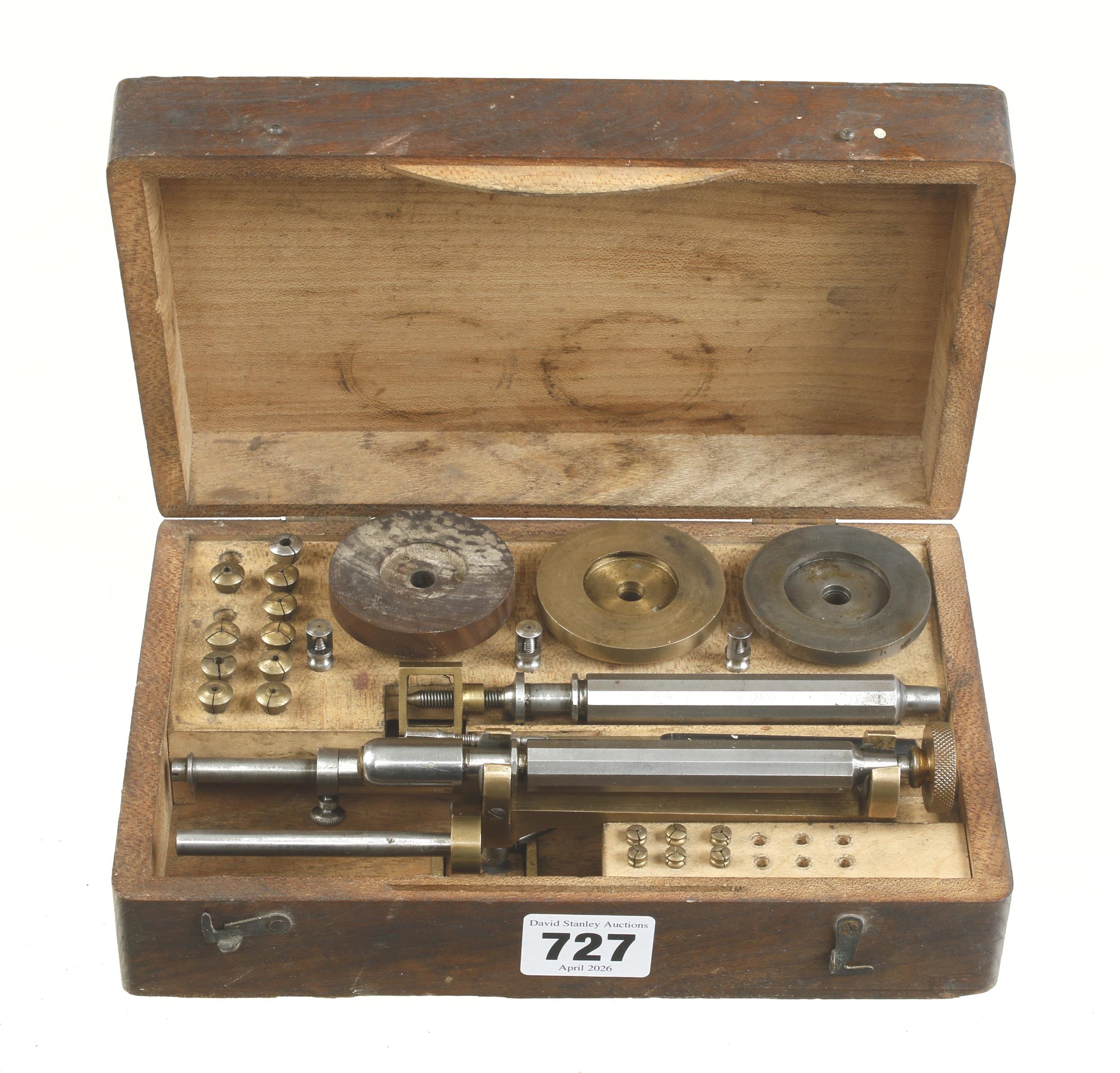 An almost complete watchmaker's polishing tool set in orig box G+