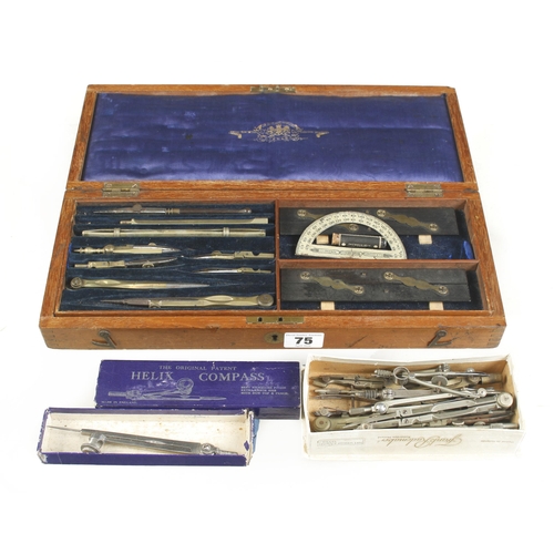 75 - A set of brass drawing instruments etc G+
