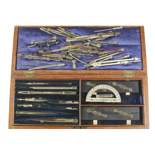 75 - A set of brass drawing instruments etc G+