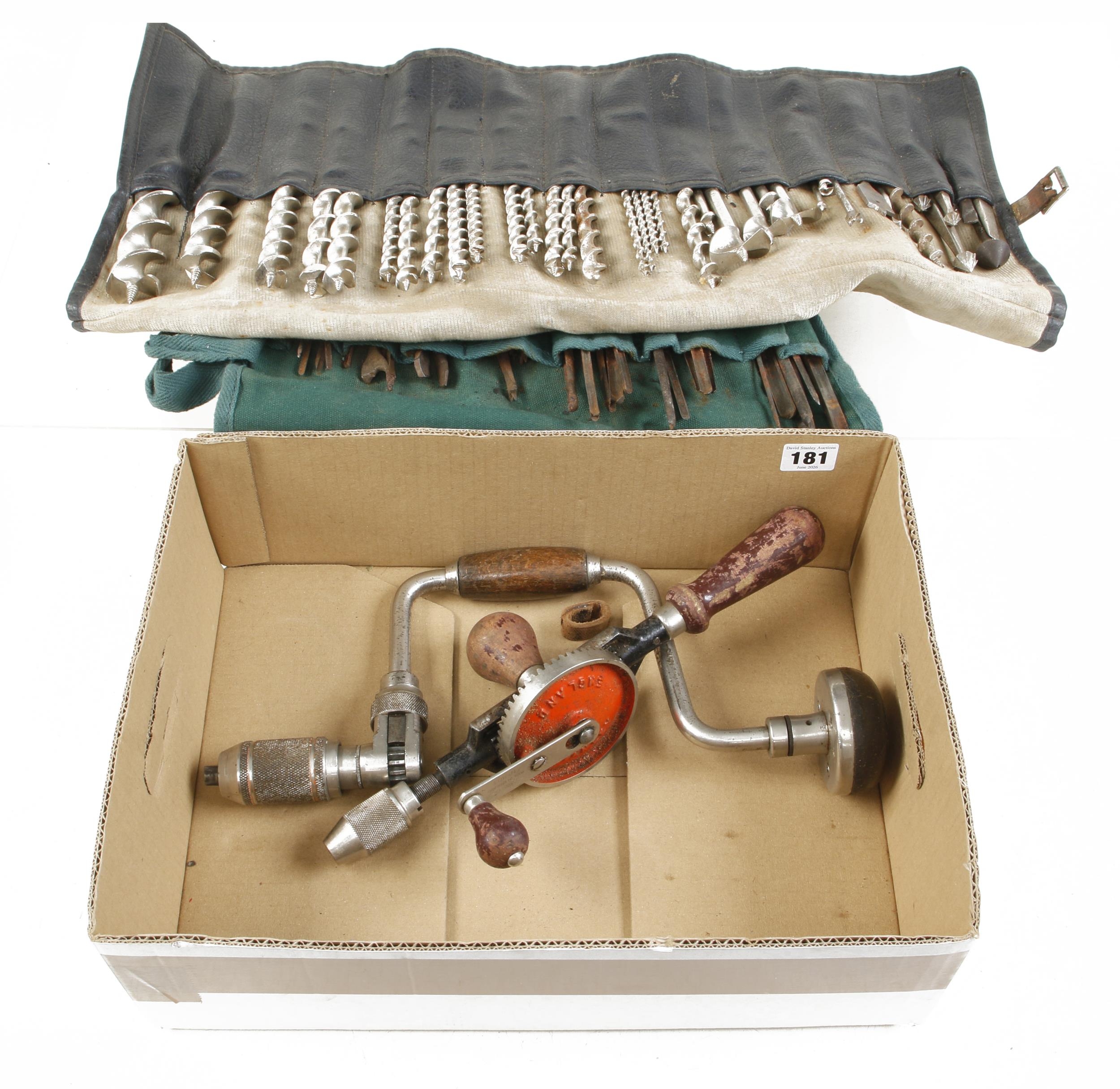 A ratchet brace, hand drill and two rolls of bits G+