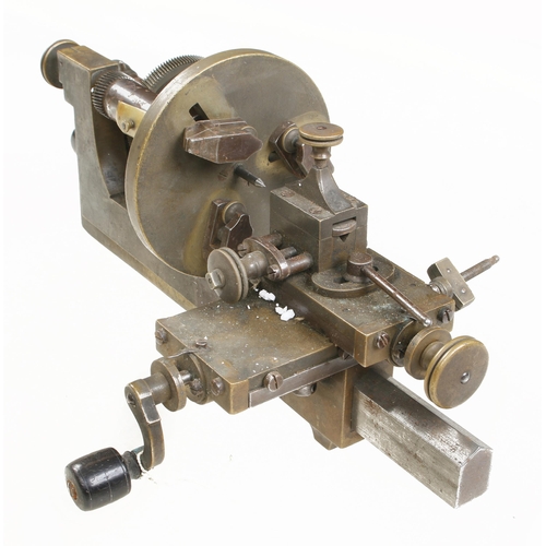 50 - A watchmaker's brass lathe with attachments G