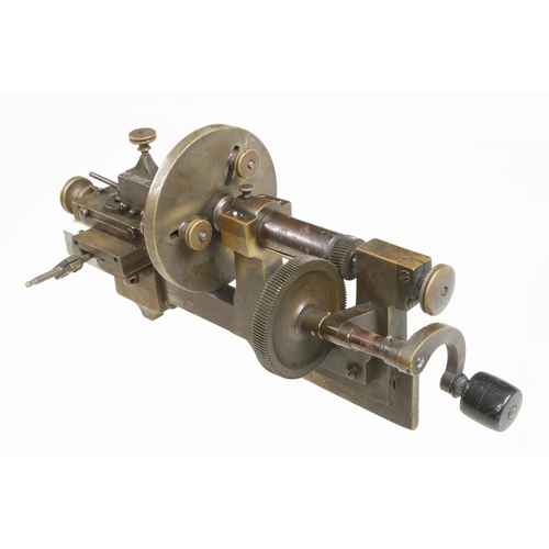50 - A watchmaker's brass lathe with attachments G