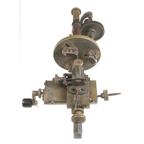 50 - A watchmaker's brass lathe with attachments G