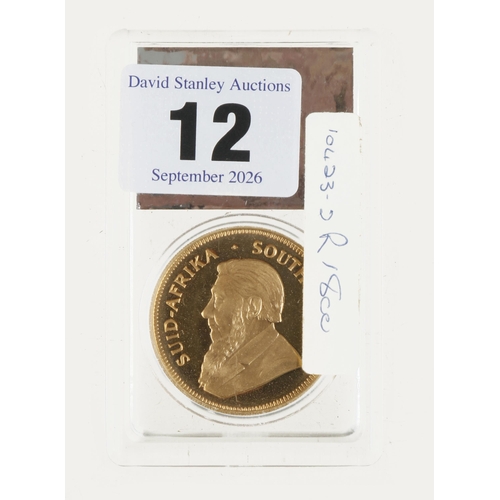 12 - A 1977 gold Krugerrand 33.93 grams total weight in orig sealed case