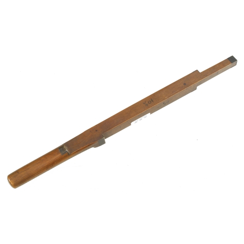 An unusual, fine quality boxwood and brass depth or length measuring stick by J.TREE Makers London with 5 set brass capped measured lengths from 2 1/4" to 10 3/4" purpose unknown (to us anyway) F