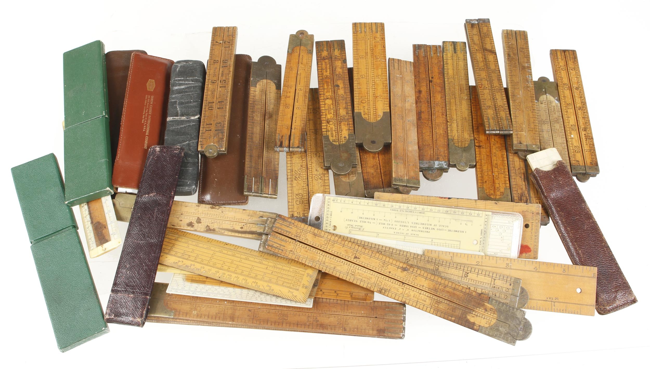 19 boxwood folding rules 16 scale rules and 5 slide rules G+