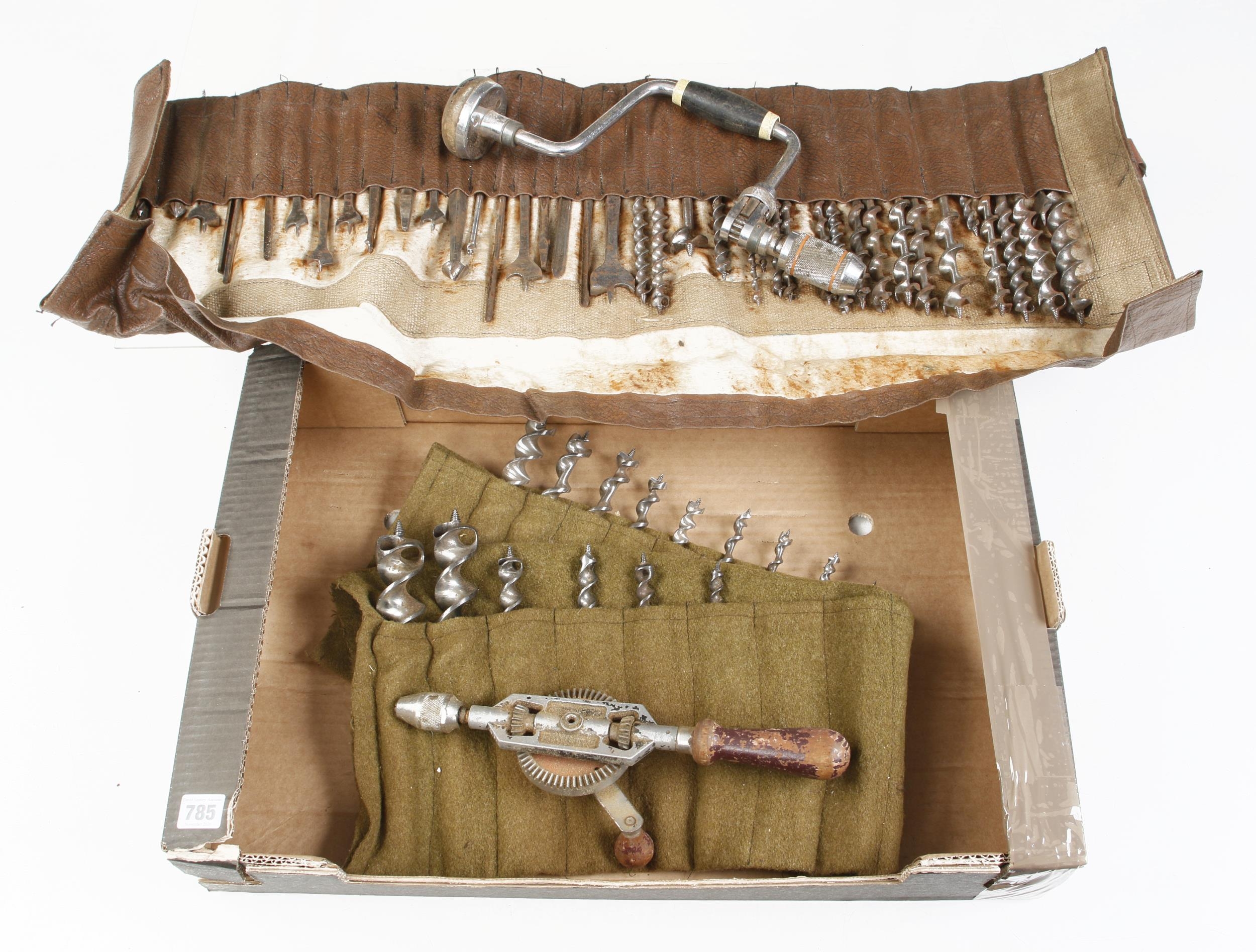 A ratchet brace, hand drill and 3 rolls of bits G+
