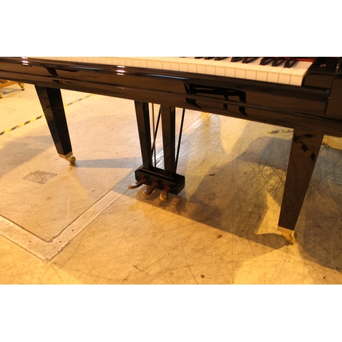 4 - Yamaha (c2009)  A 5ft 6in Model GC2 grand piano in a bright ebonised case on square tapered legs; to... 