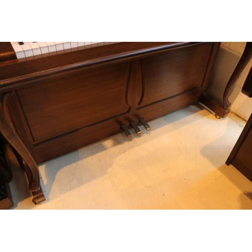 7 - Hoffmann (c1985)  A Model Barock/Chippendale upright piano in a mahogany case with cabriole supports... 