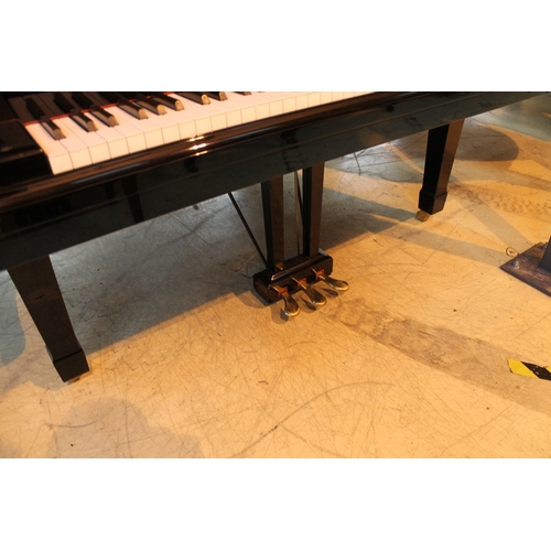 24 - Yamaha (c1984) A 7ft 6in Model C7 grand piano in a bright ebonised case on square tapered legs. AMEN... 