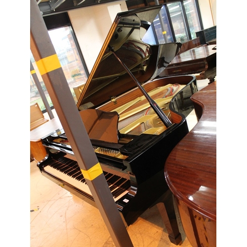 24 - Yamaha (c1984) A 7ft 6in Model C7 grand piano in a bright ebonised case on square tapered legs. AMEN... 