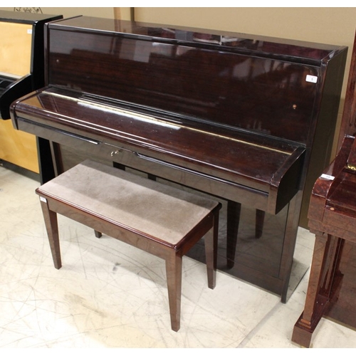 5 - Elysian A recent upright piano in a modern style bright mahogany case; together with a stool