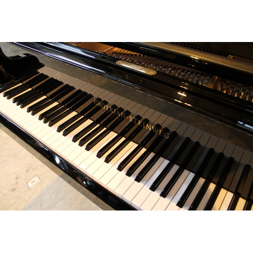 45 - Grotrian Steinweg (c2011) A 6ft 3in Model 192 grand piano in a bright ebonised case on square tapere... 