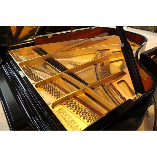 45 - Grotrian Steinweg (c2011) A 6ft 3in Model 192 grand piano in a bright ebonised case on square tapere... 