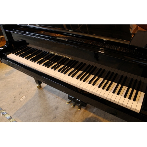 45 - Grotrian Steinweg (c2011) A 6ft 3in Model 192 grand piano in a bright ebonised case on square tapere... 