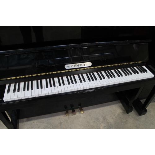 23 - ElysianA recent upright piano in a traditional ebonised case.