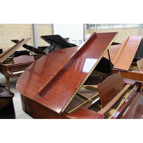 24 - Yamaha (c1970)A 6ft 1in Model C3 grand piano in a bright mahogany case on square tapered legs; toget... 