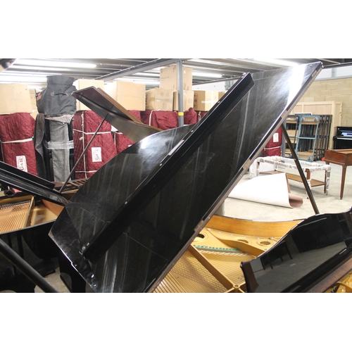 26 - Bechstein (c1920s)A 5ft 10in Model M grand piano in a bright ebonised case on square tapered legs; t... 