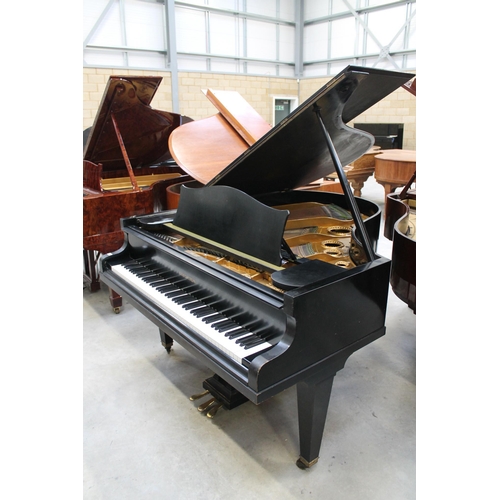 3 - Bechstein (c1931)A 5ft 10in Model M grand piano in an ebonised case on square tapered legs; together... 