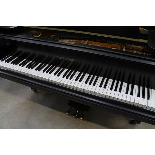 3 - Bechstein (c1931)A 5ft 10in Model M grand piano in an ebonised case on square tapered legs; together... 