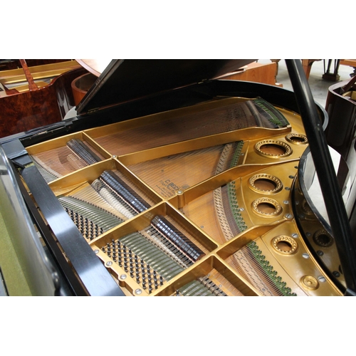 3 - Bechstein (c1931)A 5ft 10in Model M grand piano in an ebonised case on square tapered legs; together... 